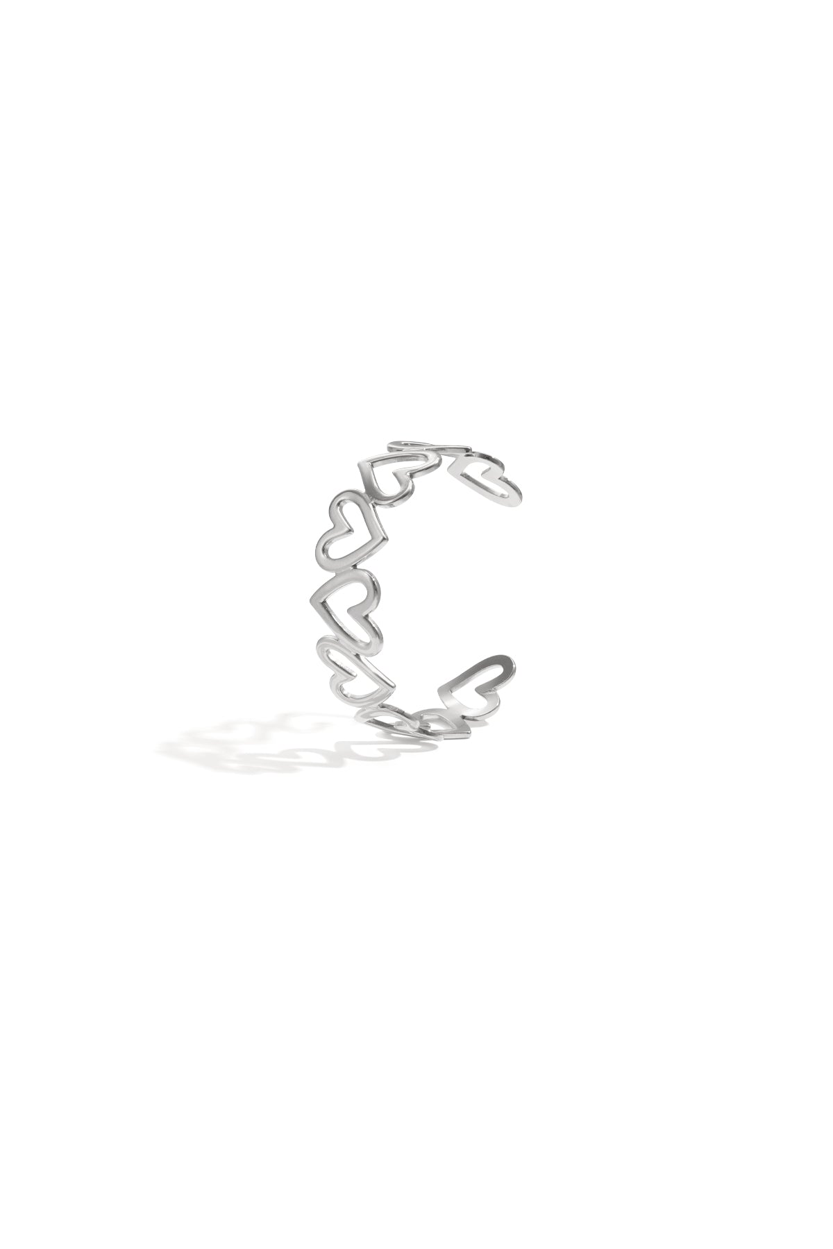 Silver-tone open cuff bracelet with linked hollow heart shapes displayed on white background