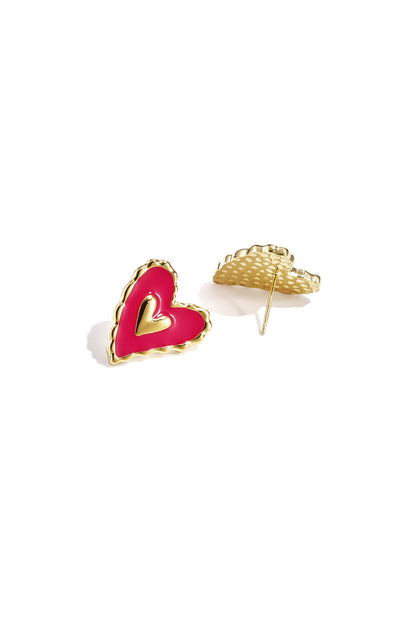 Puffy Heart Vibes earrings featuring hot pink heart-shaped enamel with a central gold heart and scalloped gold edges.