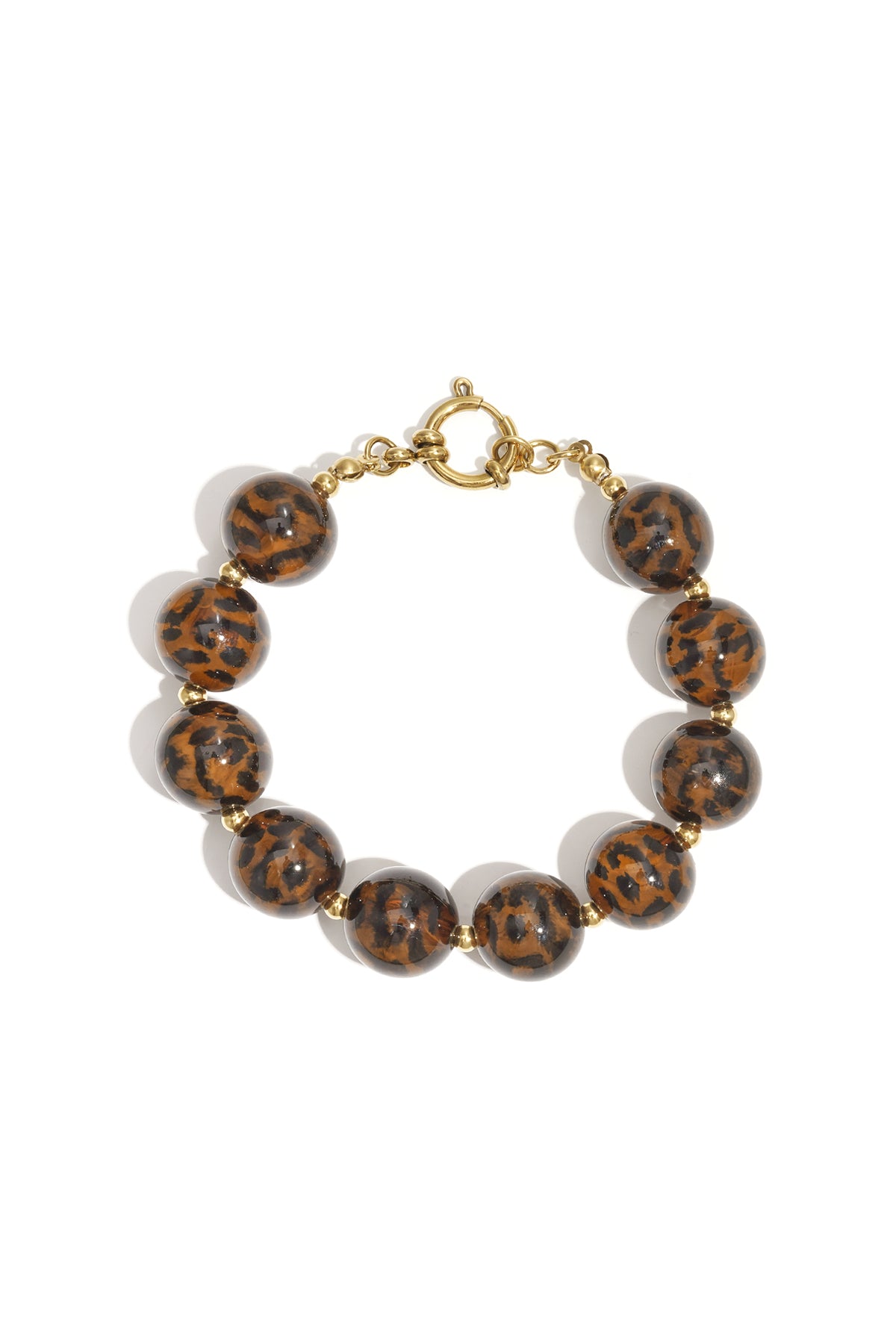 Leopard print acrylic beaded bracelet with gold-tone toggle clasp displayed on white background
