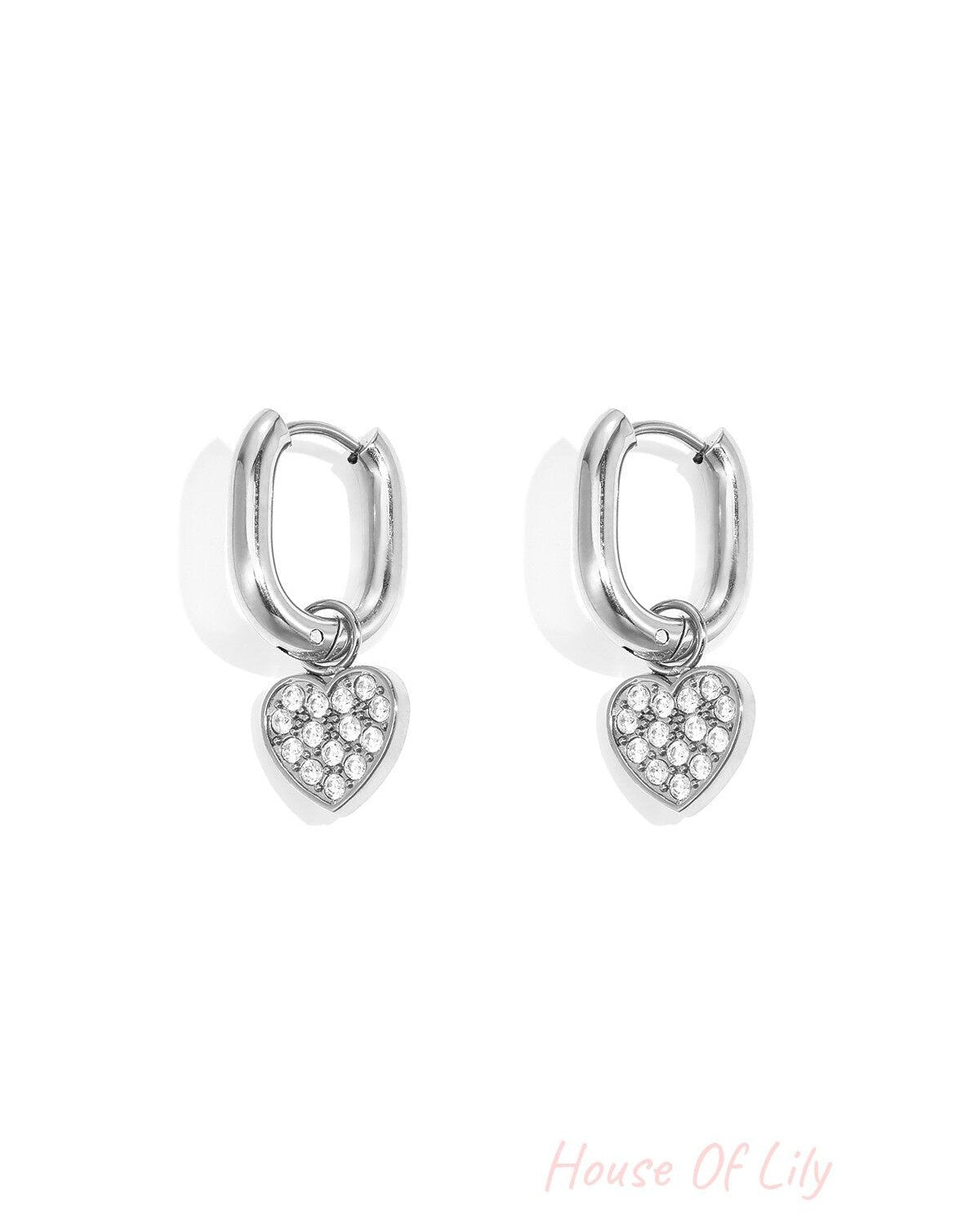 Squoval earrings with set heart charms