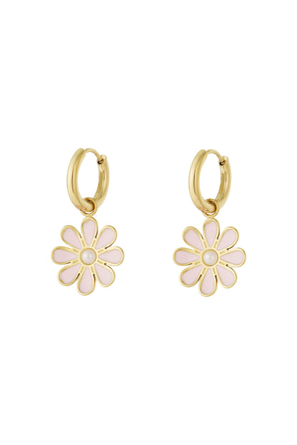Pair of gold hoop earrings with soft pastel pink enamel flower charms and pearl center on white background