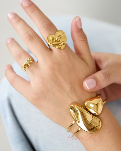 Cuff statement bracelet with organic shapes