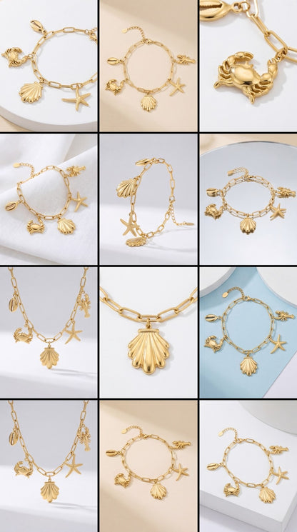 Seaside Charm Bracelet: Gold chain link bracelet featuring hanging charms of a crab, starfish, seashell, and lobster.
