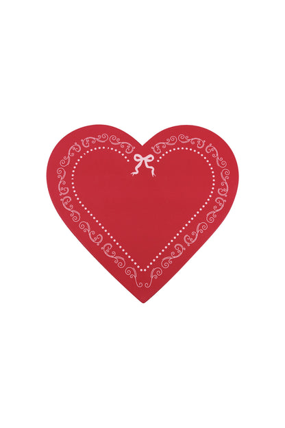 Red heart-shaped gift box lid with white decorative border and ribbon design